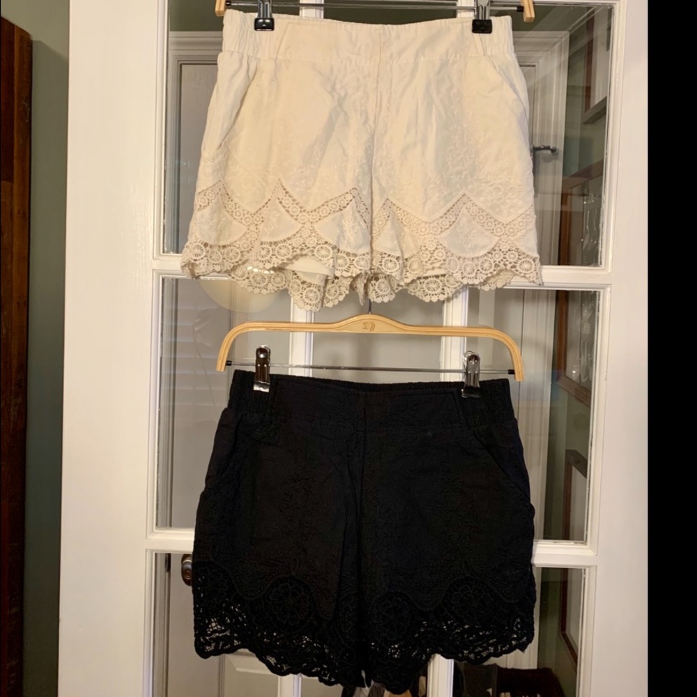 2 pairs of lace trim shorts, 1 white/1 black pair